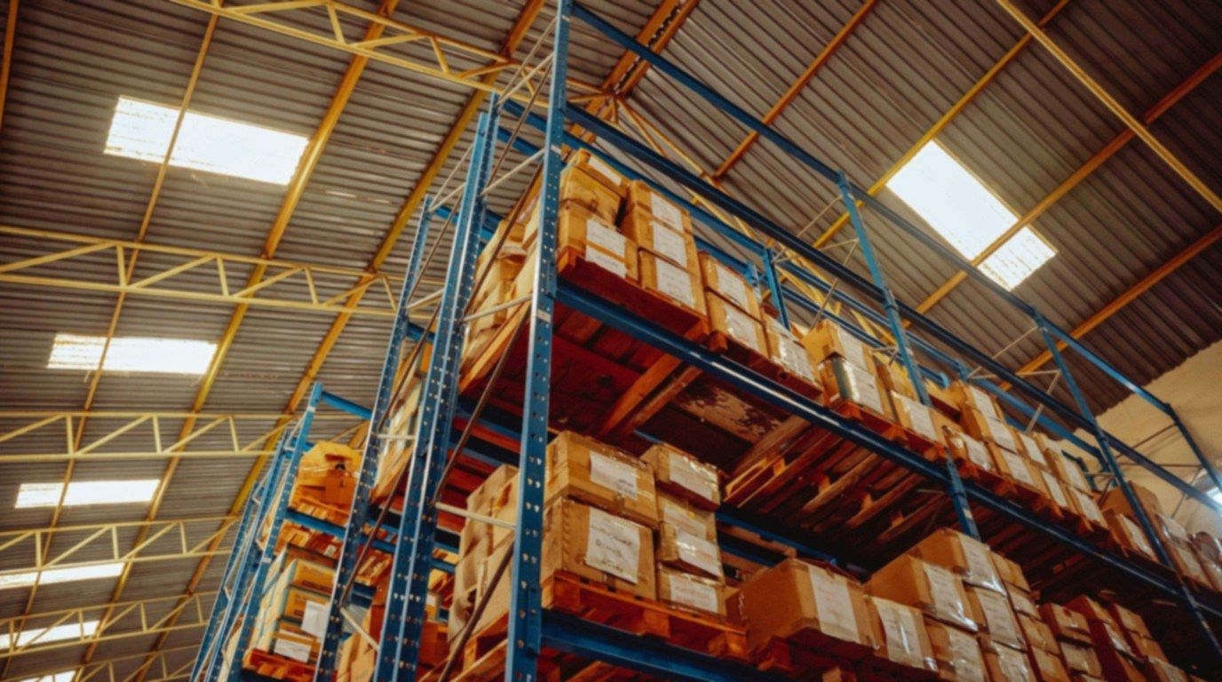 Cartons stacked on pallet racks in a warehouse